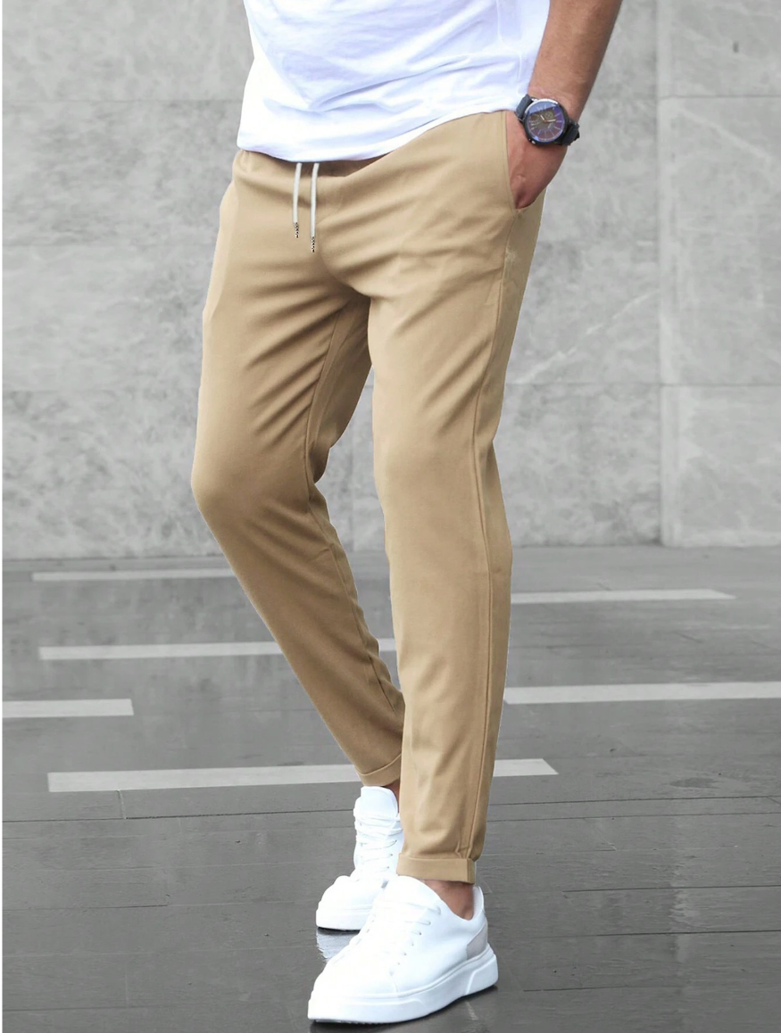 Men's Relaxed Fit Stretch Pants with Adjustable Elastic Waistband and Breathable Fabric for Work and Casual Wear